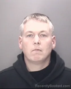 Mugshot of JOHN NEILL MCRAINEY