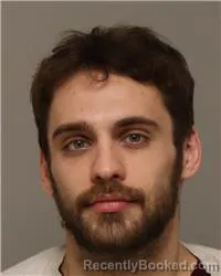 Mugshot of ALEC ESTEBAN MICHAUD-OCHU
