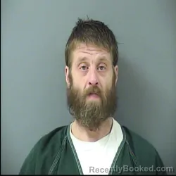 Mugshot of DAN LEO EMSLANDER