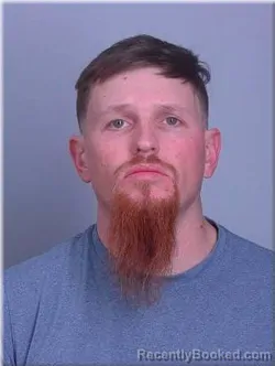 Mugshot of Charles Grazzini