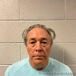 Mugshot of Michael Donald Pougnet
