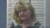 Mugshot of KELLY MOORE