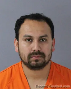 Mugshot of MIGUEL REA-CARACHURE