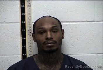 Mugshot of CORNELIUS JAMAL TATE