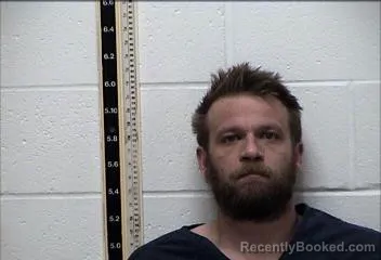 Mugshot of NATHANIEL J SCHUECKER