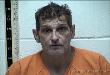 Mugshot of JOHN GRADY DELAHOUSSAYE