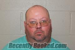 Booking photo from Benton County, Missouri