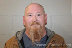 Booking photo from Benton County, Missouri