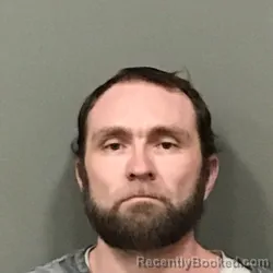 Mugshot of JUSTIN CORY MICHAELS