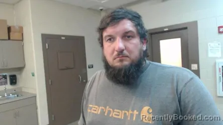 Booking photo from Cedar County, Missouri