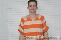 Mugshot of LOGAN WILLIAM BLOOMINGTON