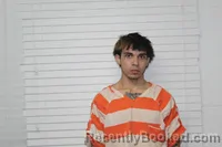 Mugshot of RAYMOND ISAAC CARMONA