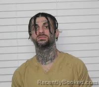 Mugshot of ENX LON KHOSHABA