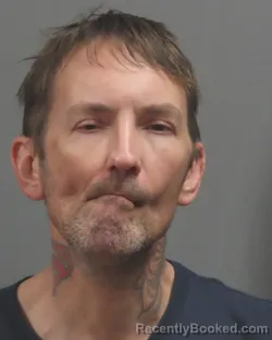 Mugshot of ARNOLD DWIGHT J BAKER