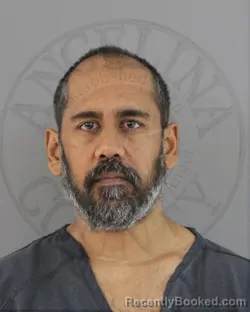 Mugshot of DOWLAT SINGHE SHARMA