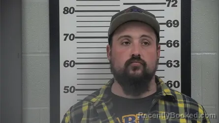 Mugshot of MJ G THOMPSON