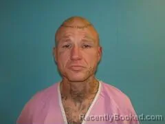 Mugshot of DUSTIN MICHAEL HUNT