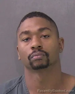 Mugshot of TAHJ JARVOUS HOLMES