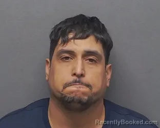 Mugshot of JONATHAN L AREVALOS