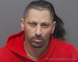 Mugshot of JORGE A JR CASIANO