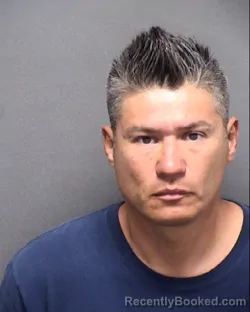 Mugshot of OMAR E BARRIOS