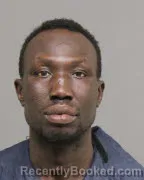 Mugshot of EMMANUEL OMOL