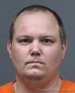 Mugshot of JUSTIN AARON POWELL