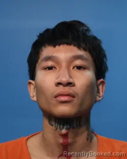 Mugshot of JUSTIN TRAN