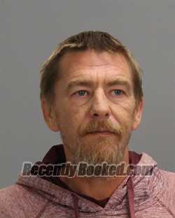 Booking photo from Brazos County, Texas