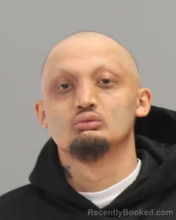 Mugshot of JOHNNY MICHAEL ACIERTO MARTINEZ