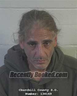 Mugshot of MICHAEL KHAMO ORAHA