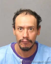 Mugshot of Claudio Ramos-Reyes