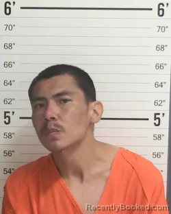 Mugshot of JUSTIN PETE ARIAS