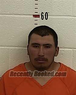Booking photo from San Miguel County, New Mexico