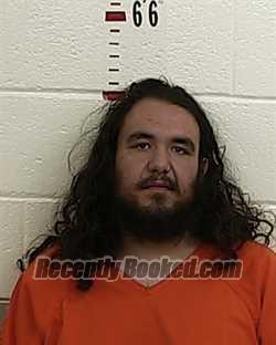 Booking photo from San Miguel County, New Mexico
