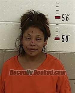 Booking photo from San Miguel County, New Mexico