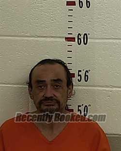 Booking photo from San Miguel County, New Mexico