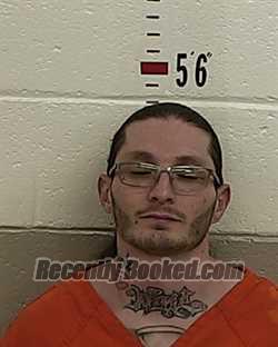 Booking photo from San Miguel County, New Mexico