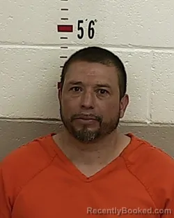 Booking photo from San Miguel County, New Mexico