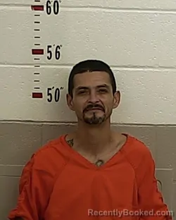 Booking photo from San Miguel County, New Mexico