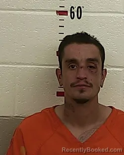 Booking photo from San Miguel County, New Mexico