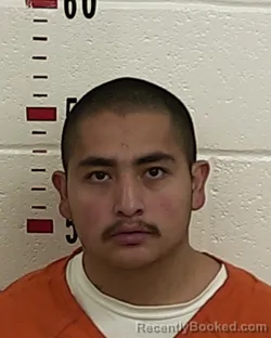 Booking photo from San Miguel County, New Mexico