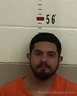 Booking photo from San Miguel County, New Mexico