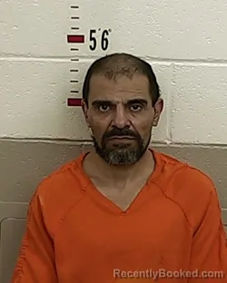 Booking photo from San Miguel County, New Mexico