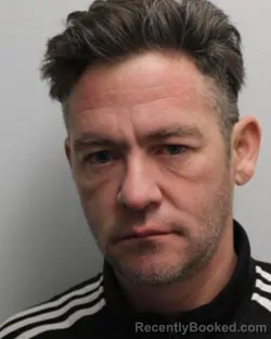 Booking photo from Chemung County, New York