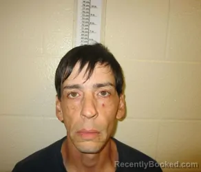 Mugshot of Gregory RUSSELL MANWARREN