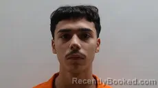 Mugshot of BUENO JOSE MANUEL