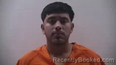 Mugshot of MELENDEZ JUSTINO
