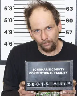 Mugshot of CARLTON V MOXHAM