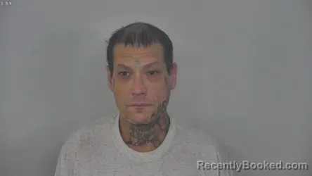 Mugshot of MARCUS BENJAMIN PELTIER